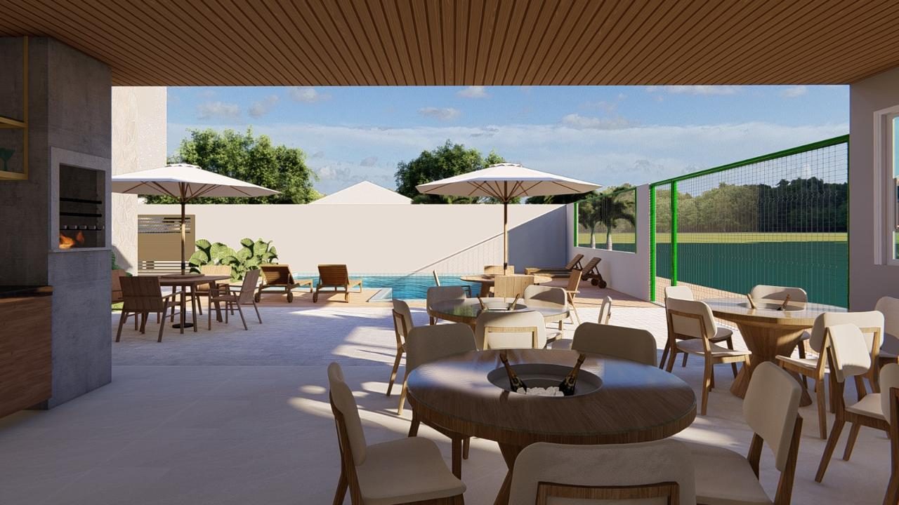 Espaço gourmet com churrasqueira e mesas
